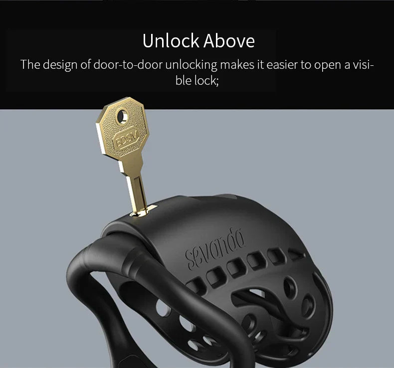 Black remote control chastity cage with key inserted showing door-to-door unlocking design