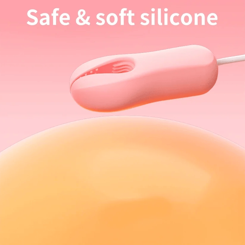 Pink electric nipple clamp vibrator made of safe and soft silicone on a peach background