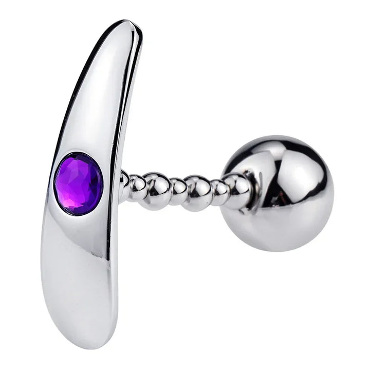 GHALLAS metal anal plug with smooth polished surface and purple gem accent