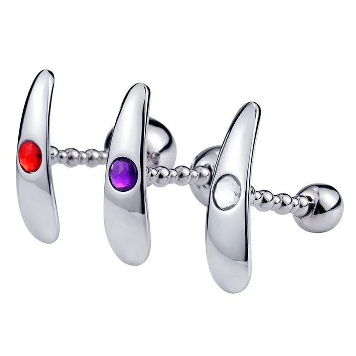 Set of three silver metal anal plugs with jeweled accents in red purple and clear by GHALLAS