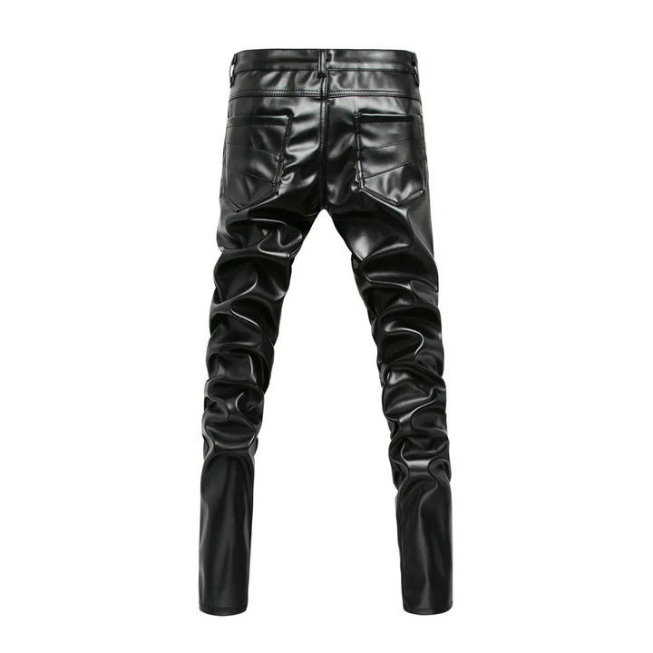 Back view of black leather zipper pants with a sleek and fitted design by ghallas
