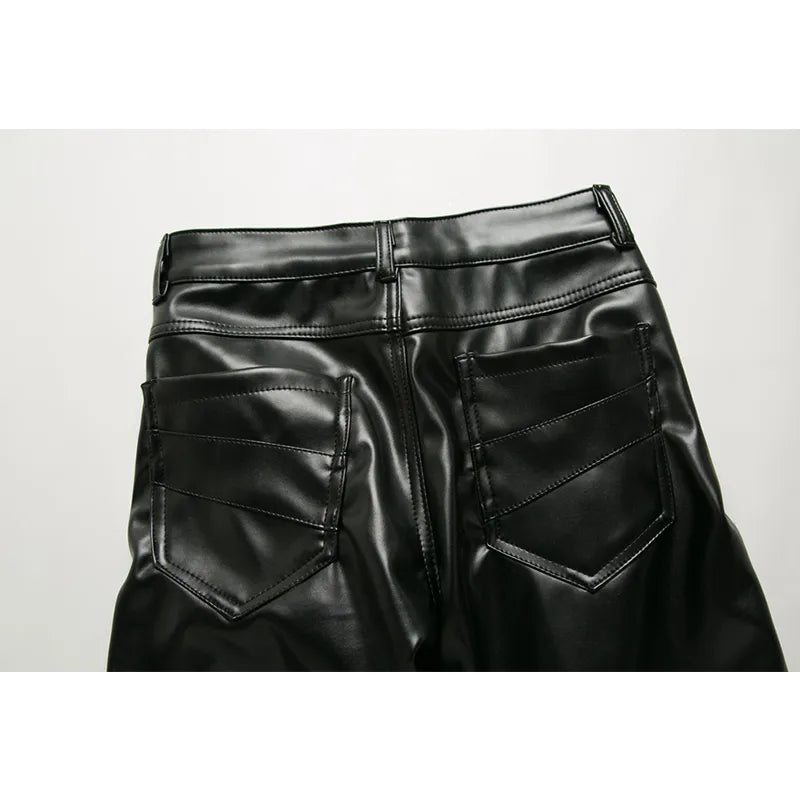 Back view of black leather zipper pants with rear pockets and belt loops by Ghallas